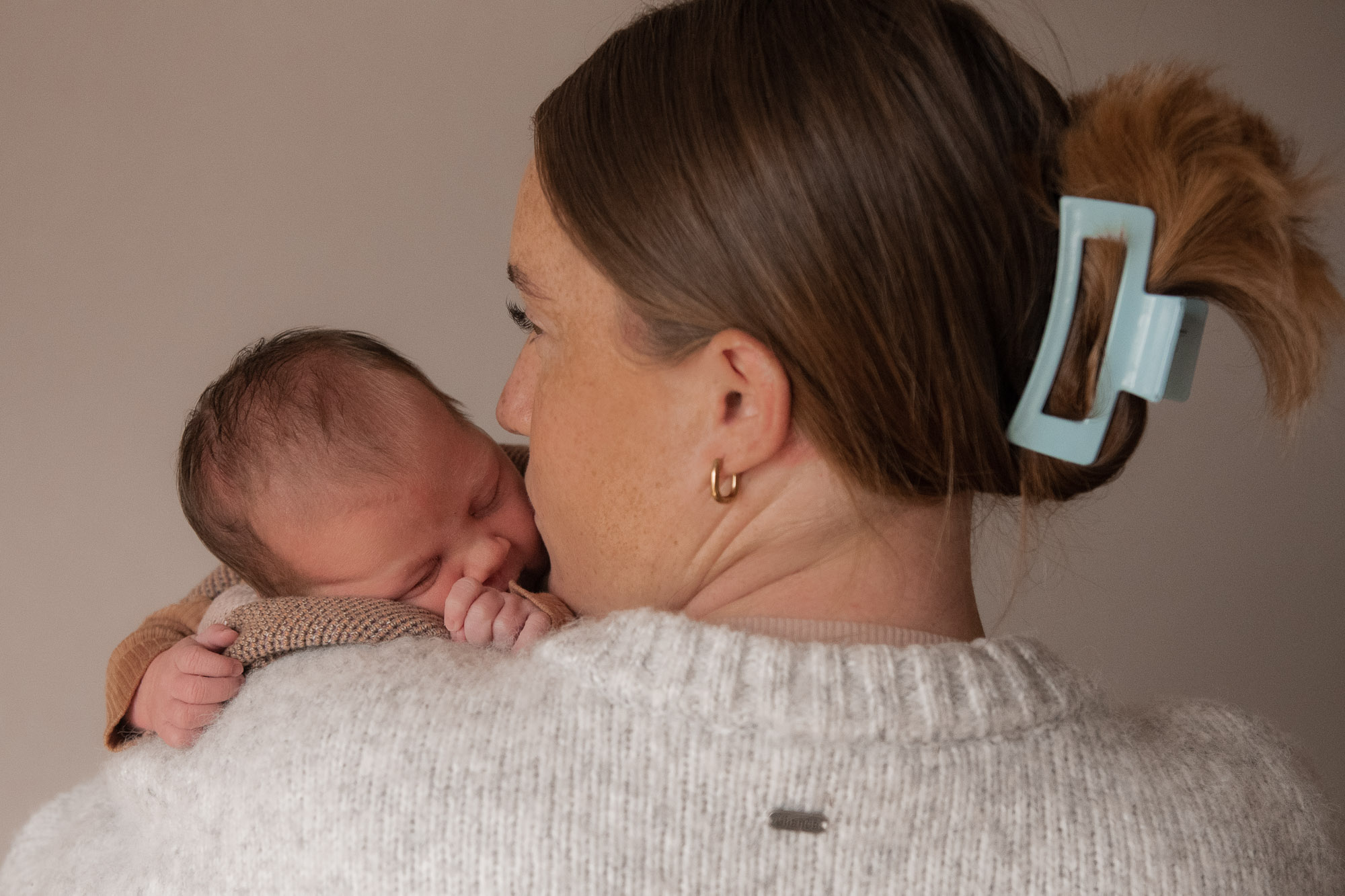 Newborn details captured in warm natural light